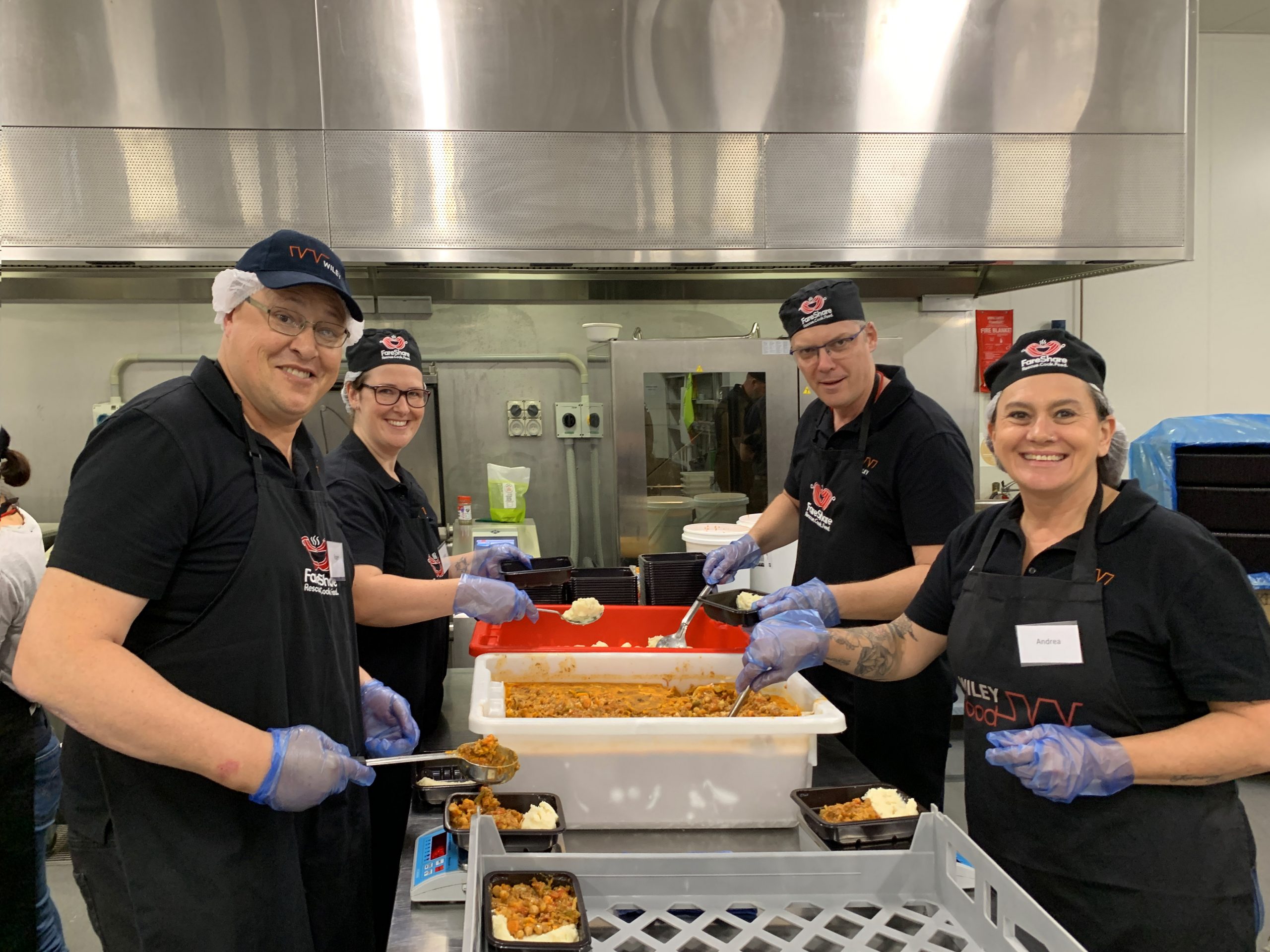 Roger Aisling Brett & Andrea packaging Meals for the Mob